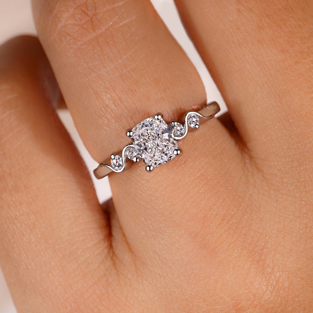 4 prong ring with a cushion cut diamond ring.

