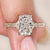 Cushion cut diamond ring with vintage filigree.
