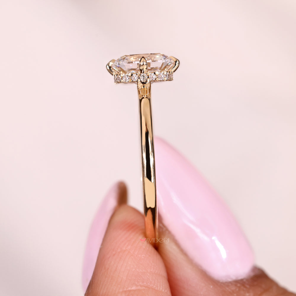 Lab grown cushion diamond ring with four compass prongs
