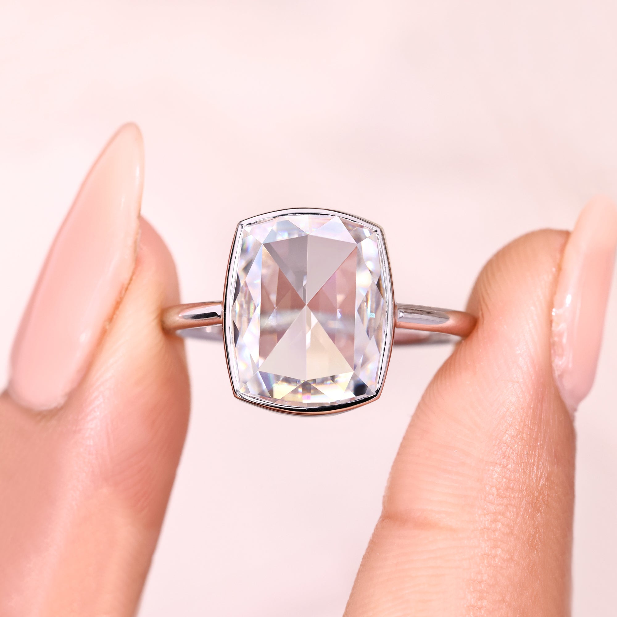 Handmade bezel set cushion rose cut moissanite ring.
