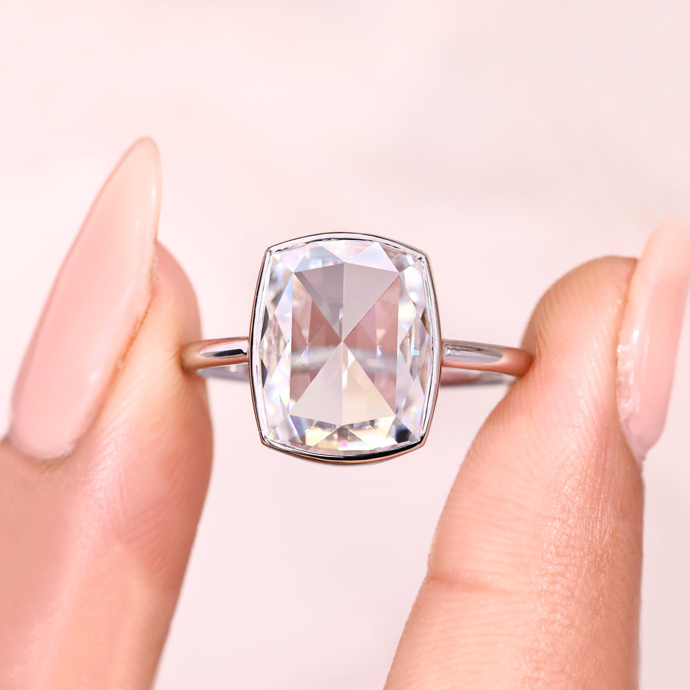 Handmade bezel set cushion rose cut moissanite ring.
