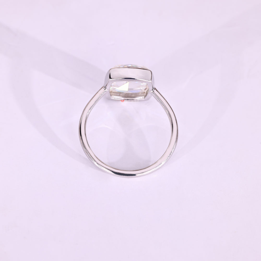 Cushion rose cut moissanite bezel set ring.
