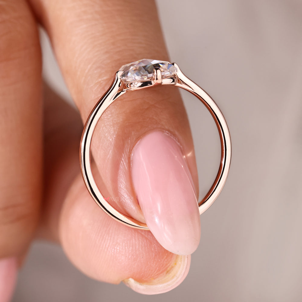 Promise ring for her with cushion cut moissanite in rose gold.
