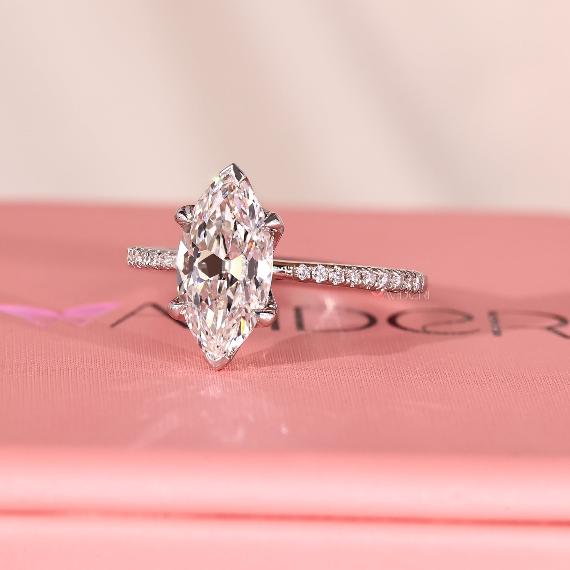 Old European cut diamond engagement ring with elegant prong design.