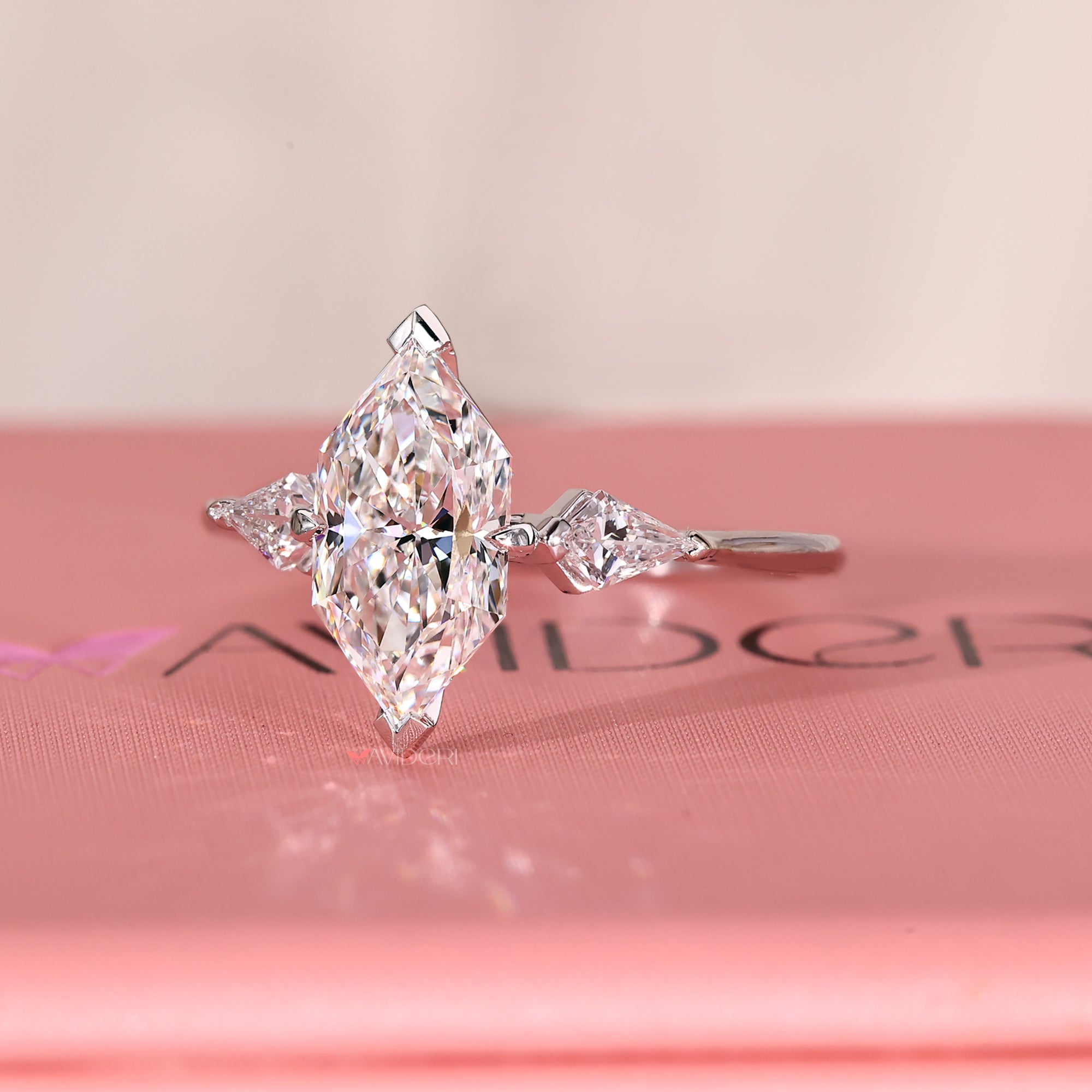 Handmade ring with Dutch marquise diamond and custom v shaped prong setting.