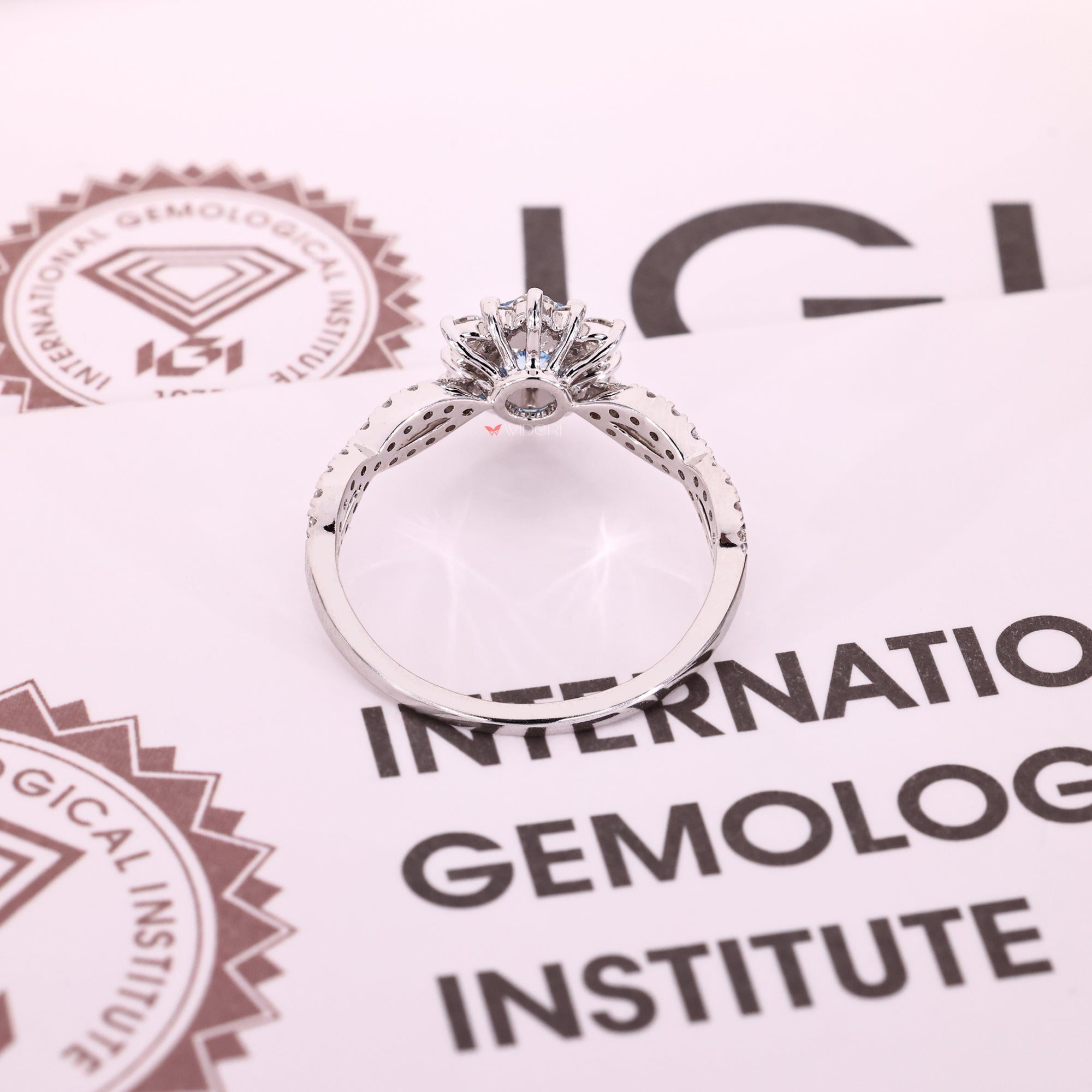 White gold diamond ring with 4 prong setting.
