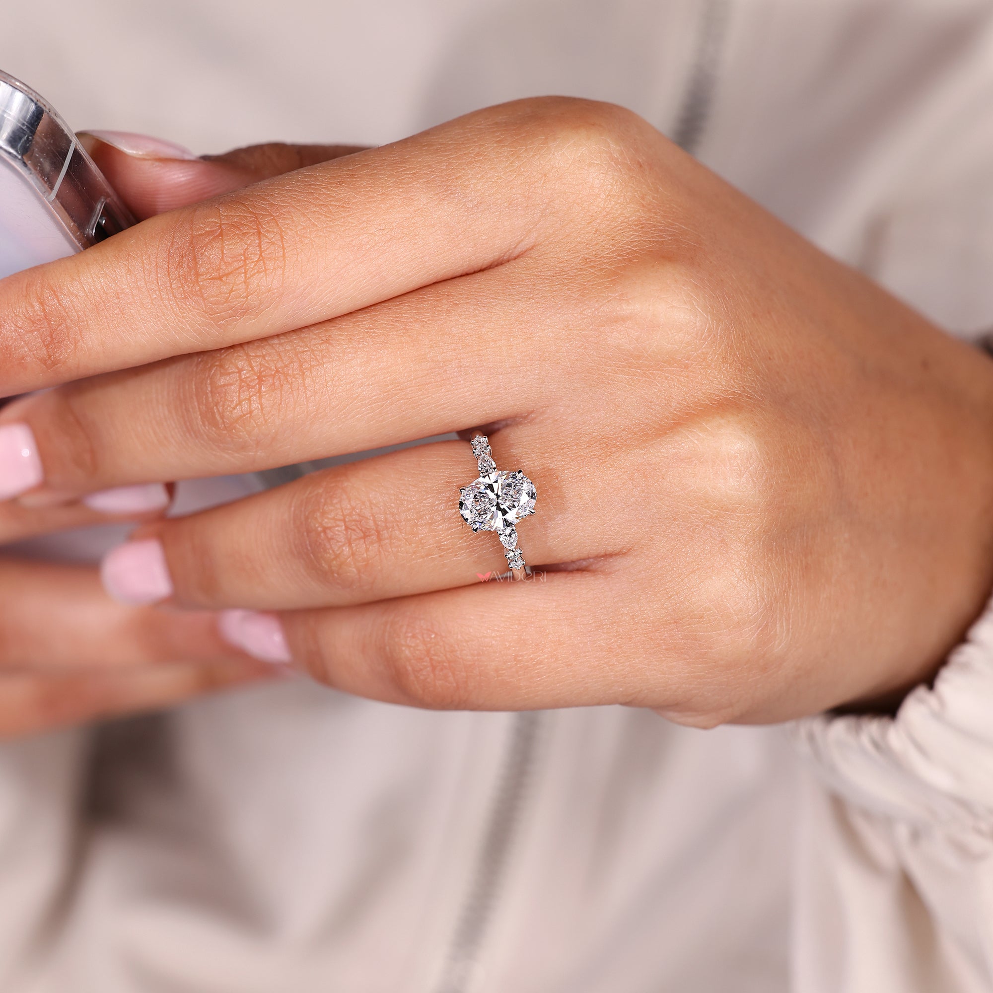 Round Side Stone Seven Stone Diamond Ring.