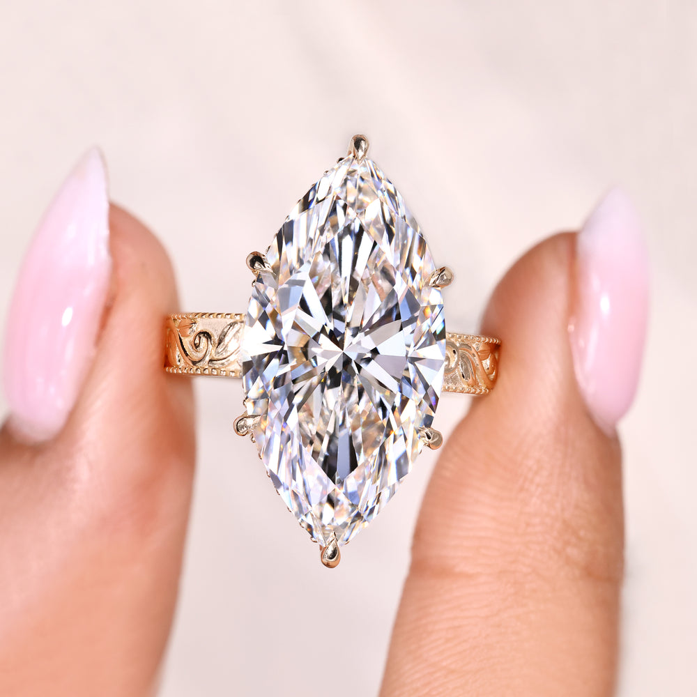Handmade ring with detailed halo setting.