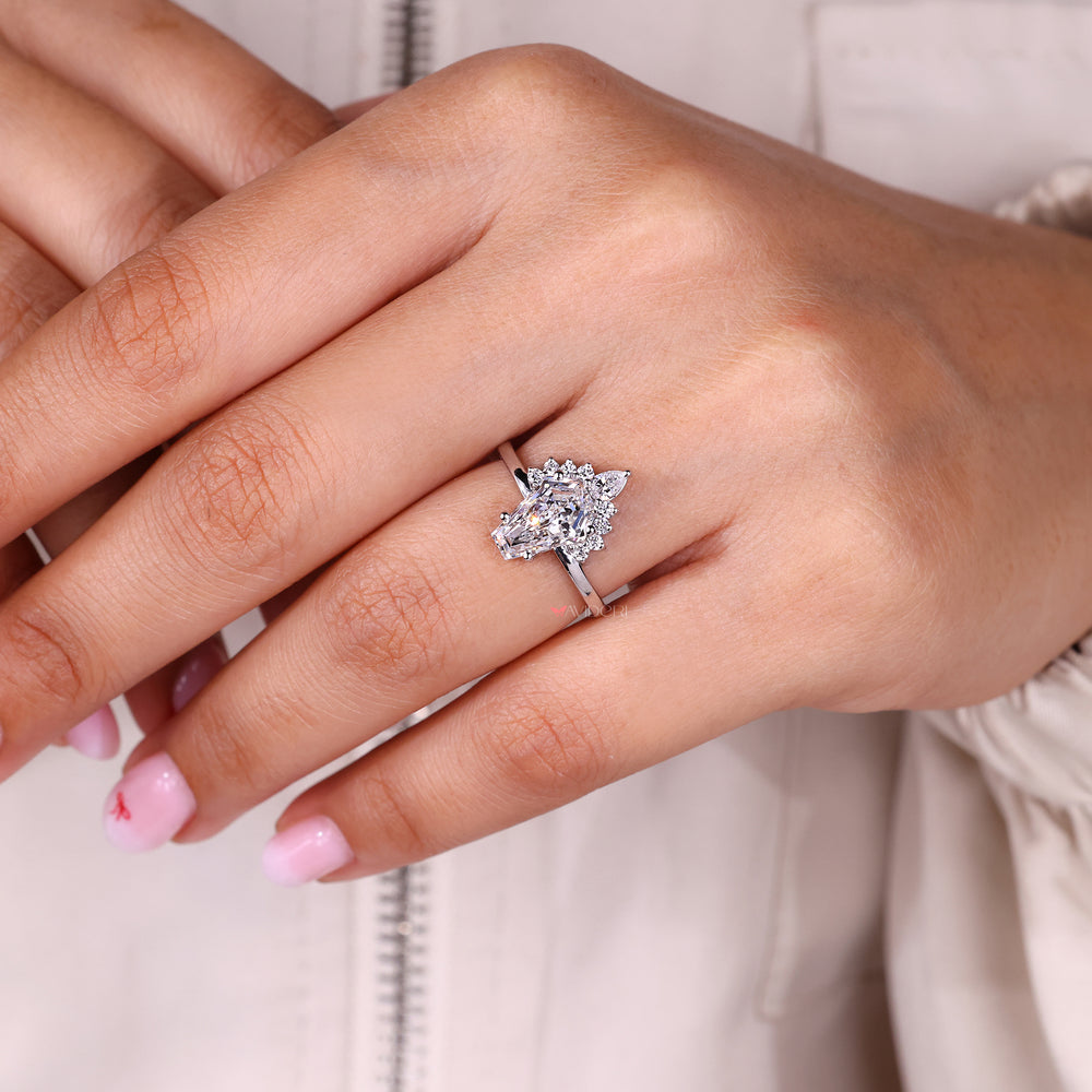 Vintage diamond ring with half halo detail.