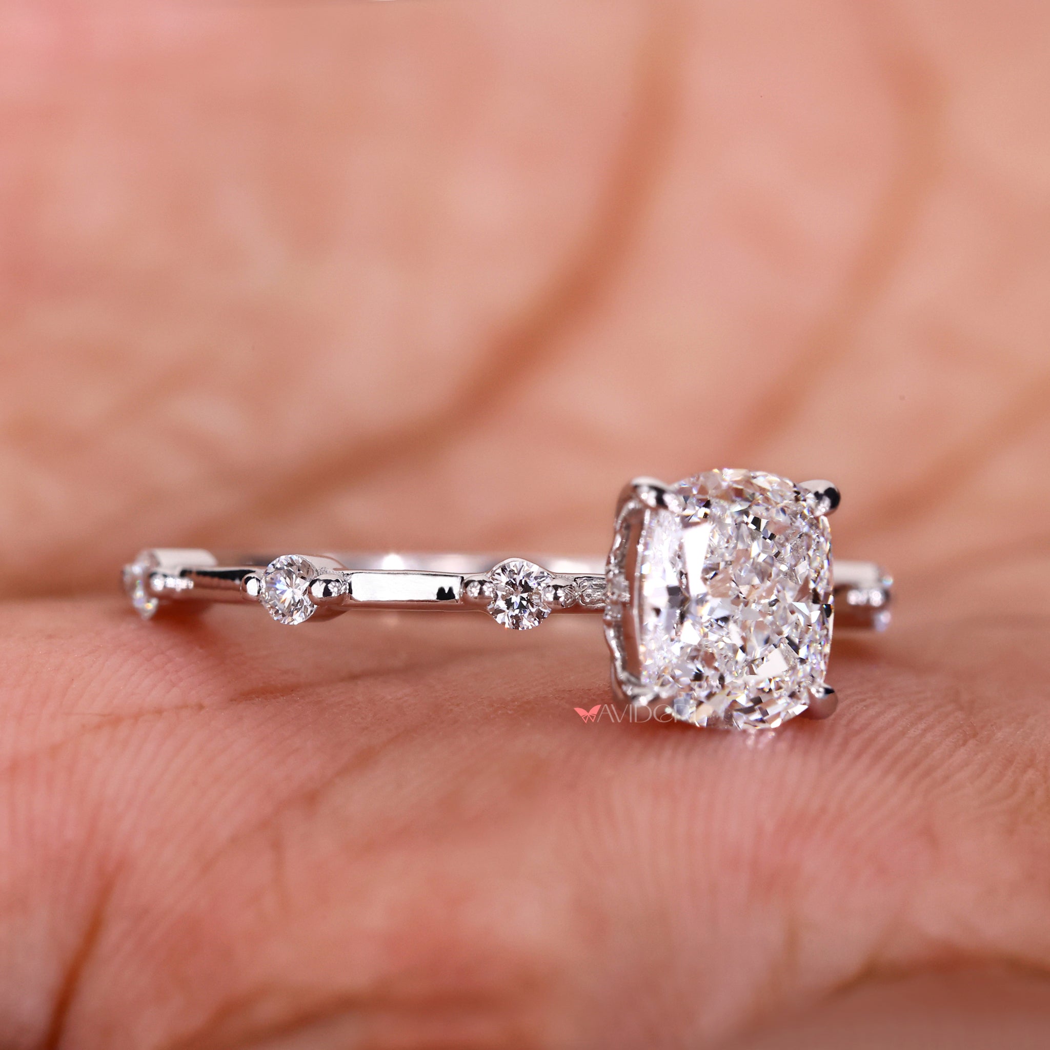 IGI certified handmade ring with a cushion-cut diamond and Distance Pave Setting for added sparkle and charm.
