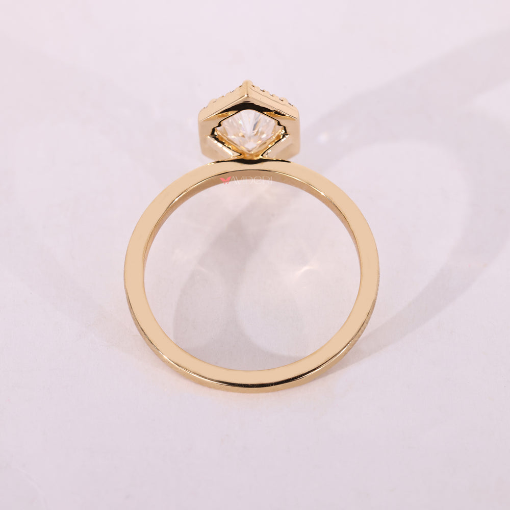 Yellow gold engagement ring with lab grown diamonds.