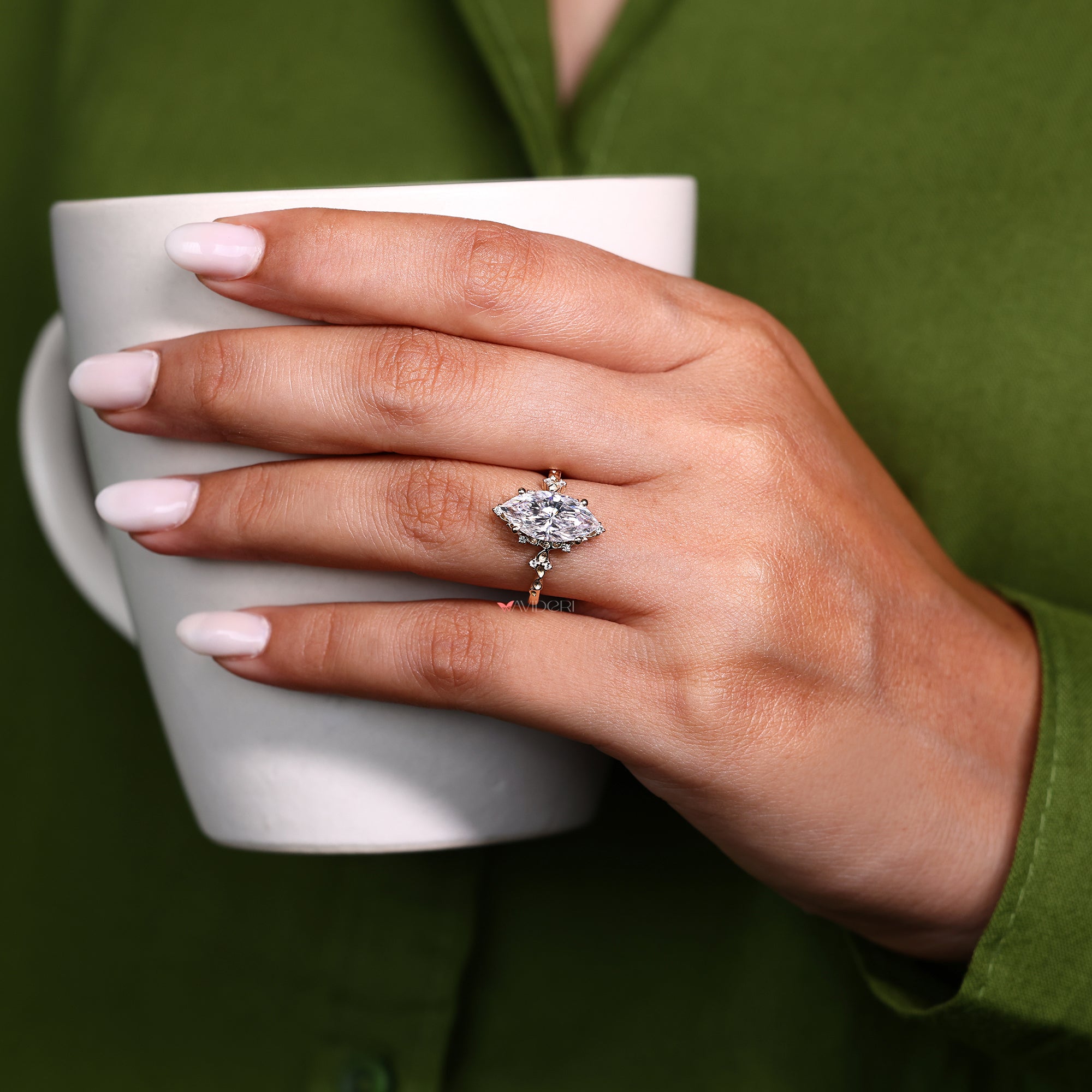 Vintage marquise engagement ring styled with 4 prong setting.