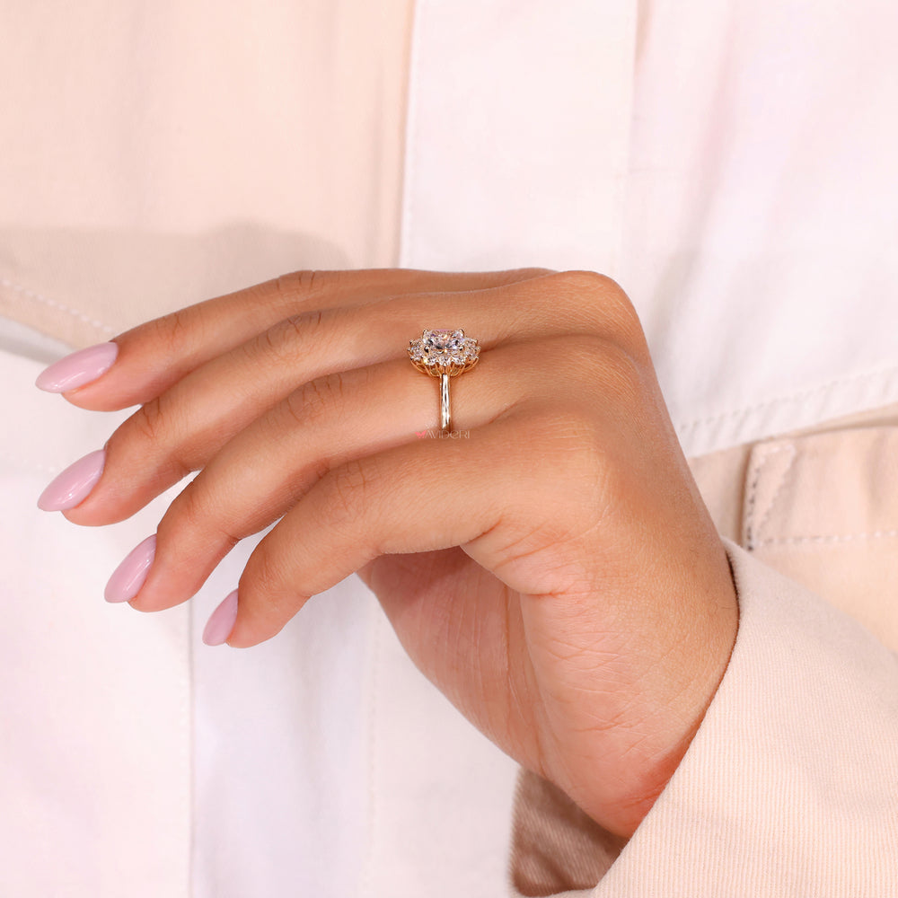 Yellow gold engagement ring with a radiant cushion cut diamond centerpiece.
