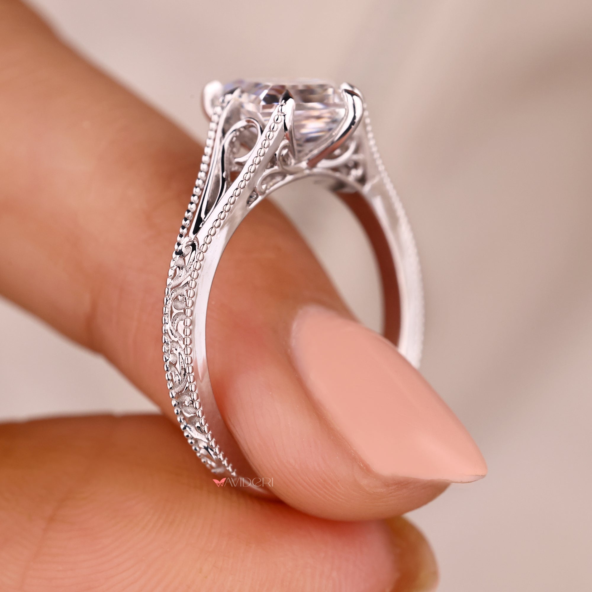 Side Art Deco design kite cut diamond ring.