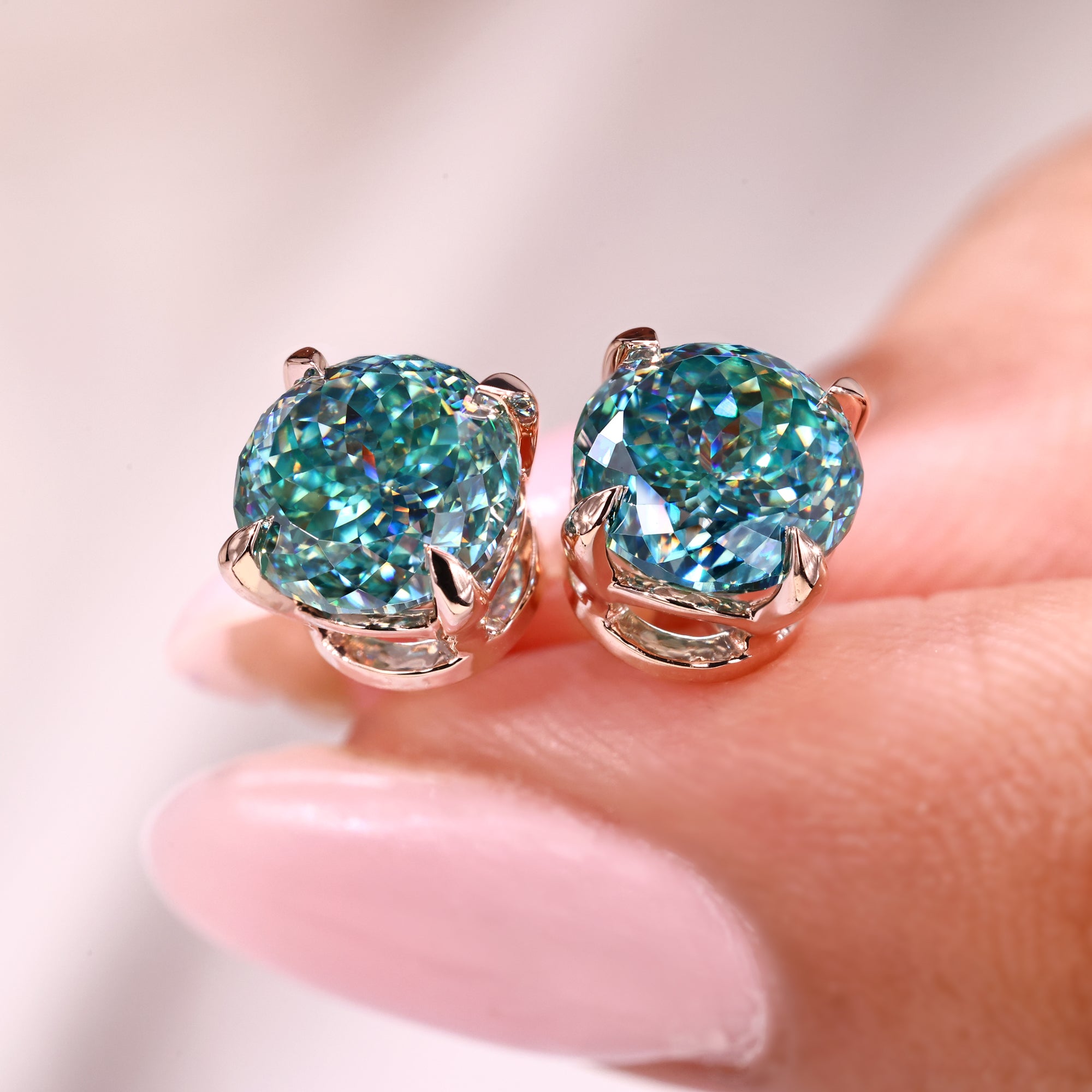 Moissanite stud earrings in a 4 claw prong setting.