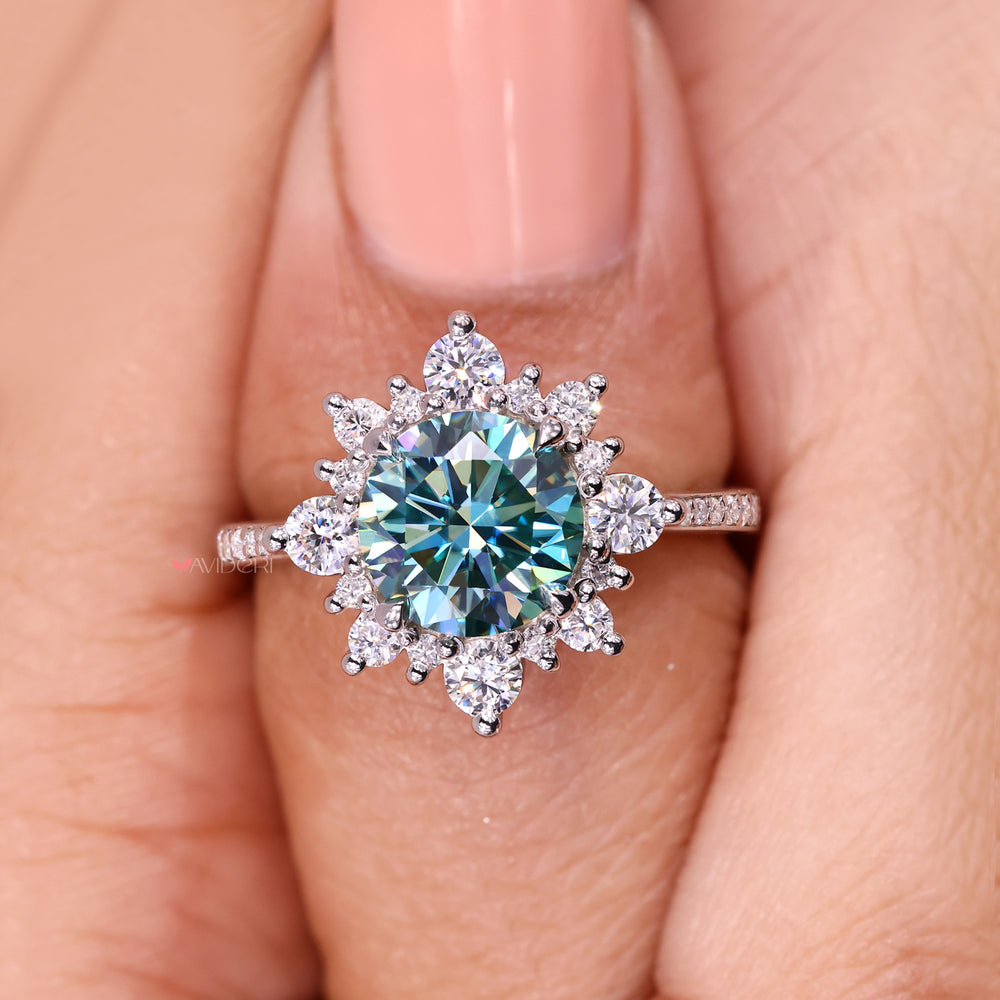 Avideri cyan blue moissanite engagement ring.
