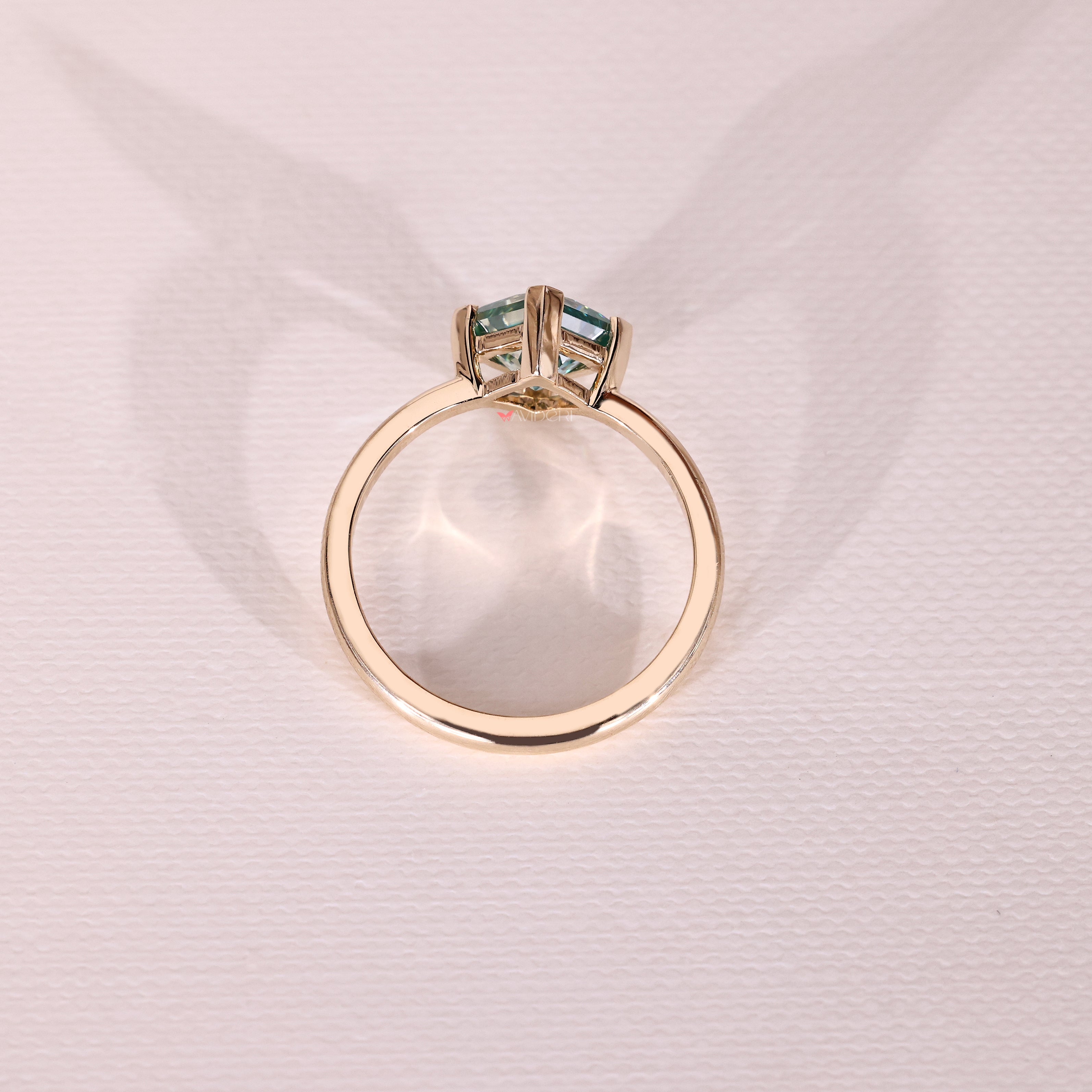 Four v prong princess moissanite ring design.
