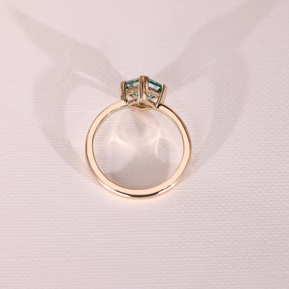 Four v prong princess moissanite ring design.
