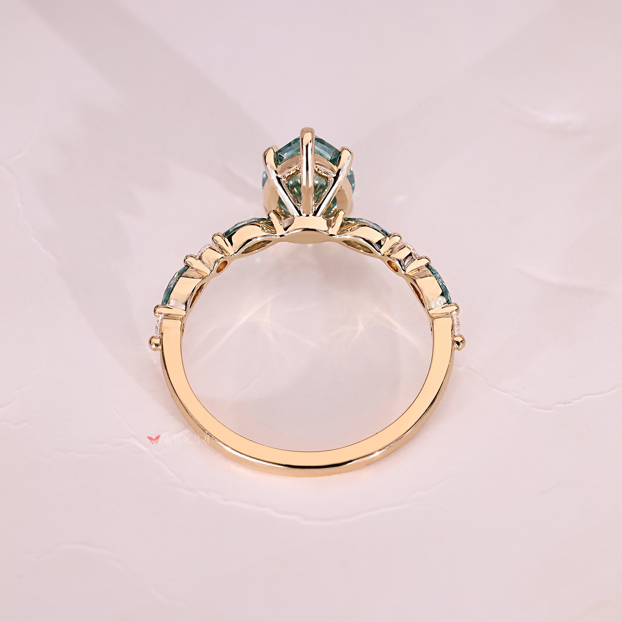 Pear cut cyan blue moissanite ring handmade.
