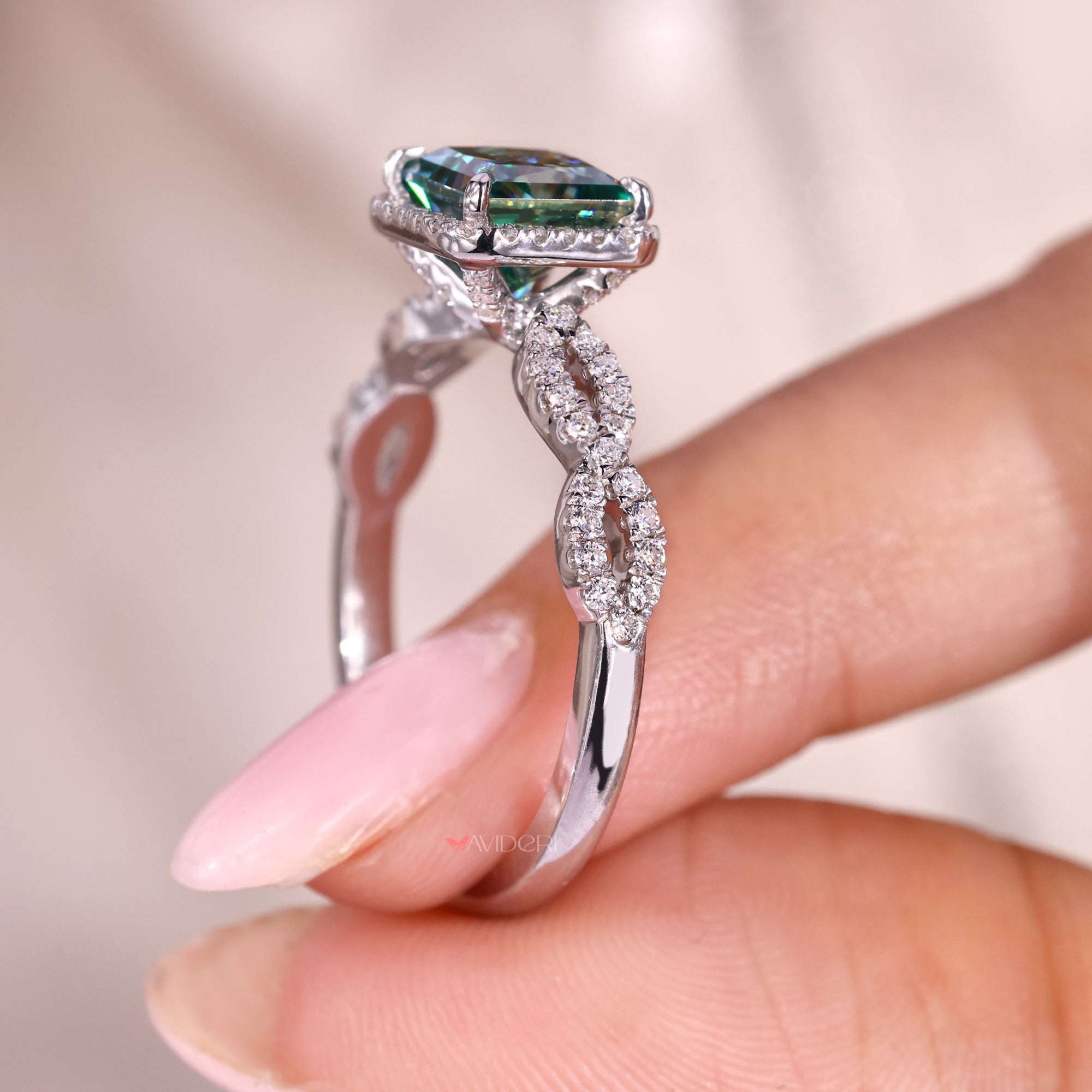 Twisted pave halo engagement ring for a modern and stylish look.
