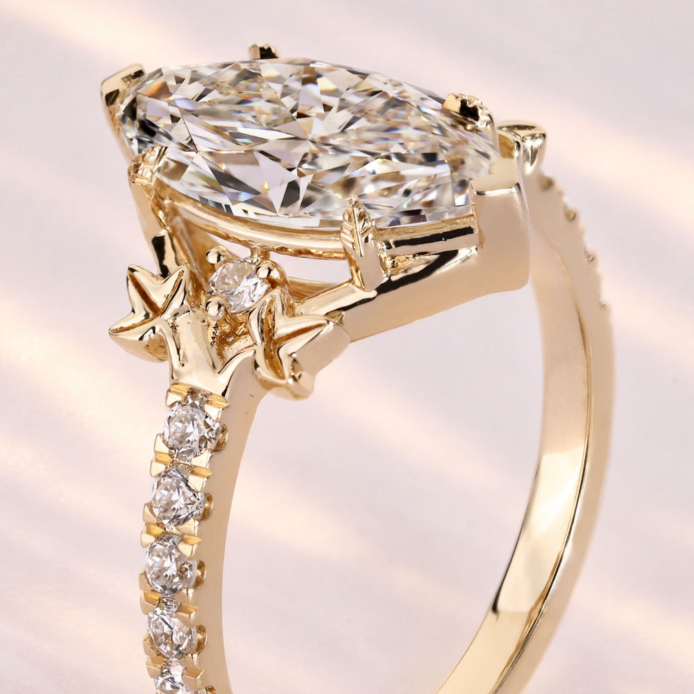 Nature inspired marquise diamond engagement ring.
