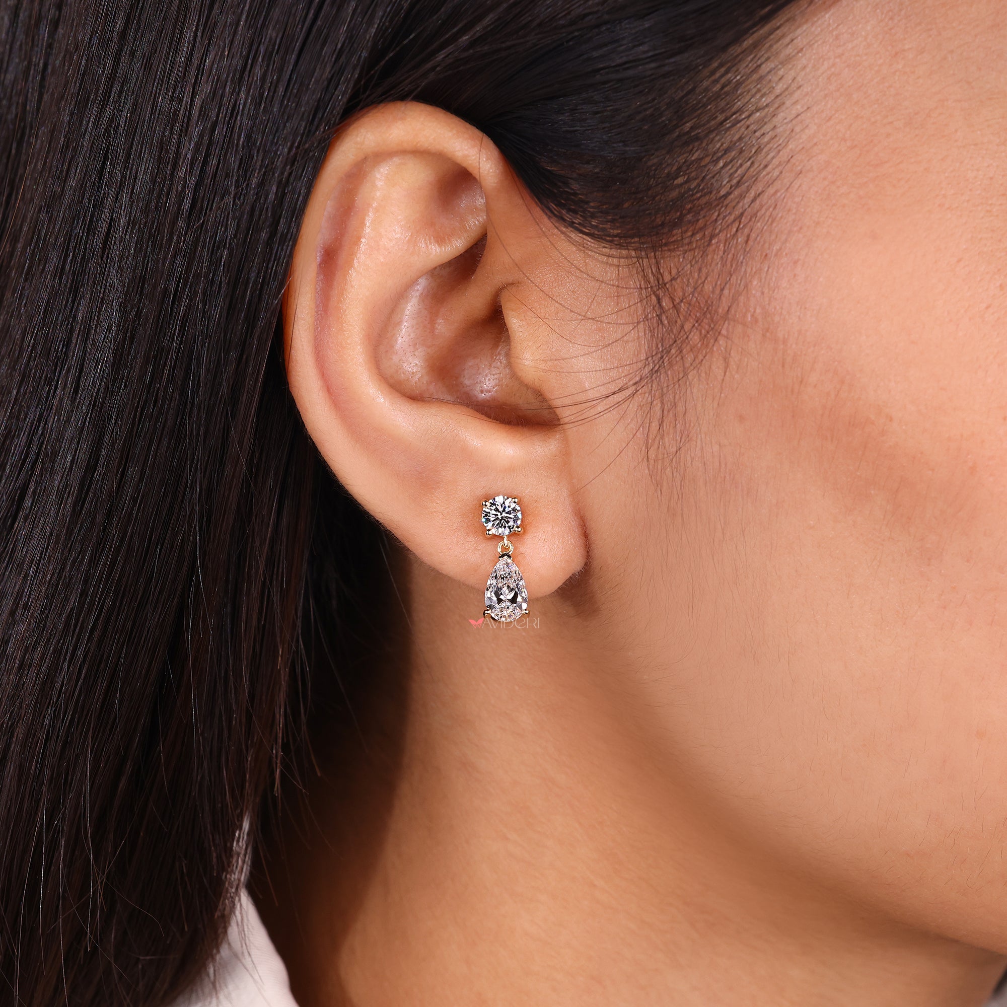 Pear shaped diamond earrings in handmade earrings.