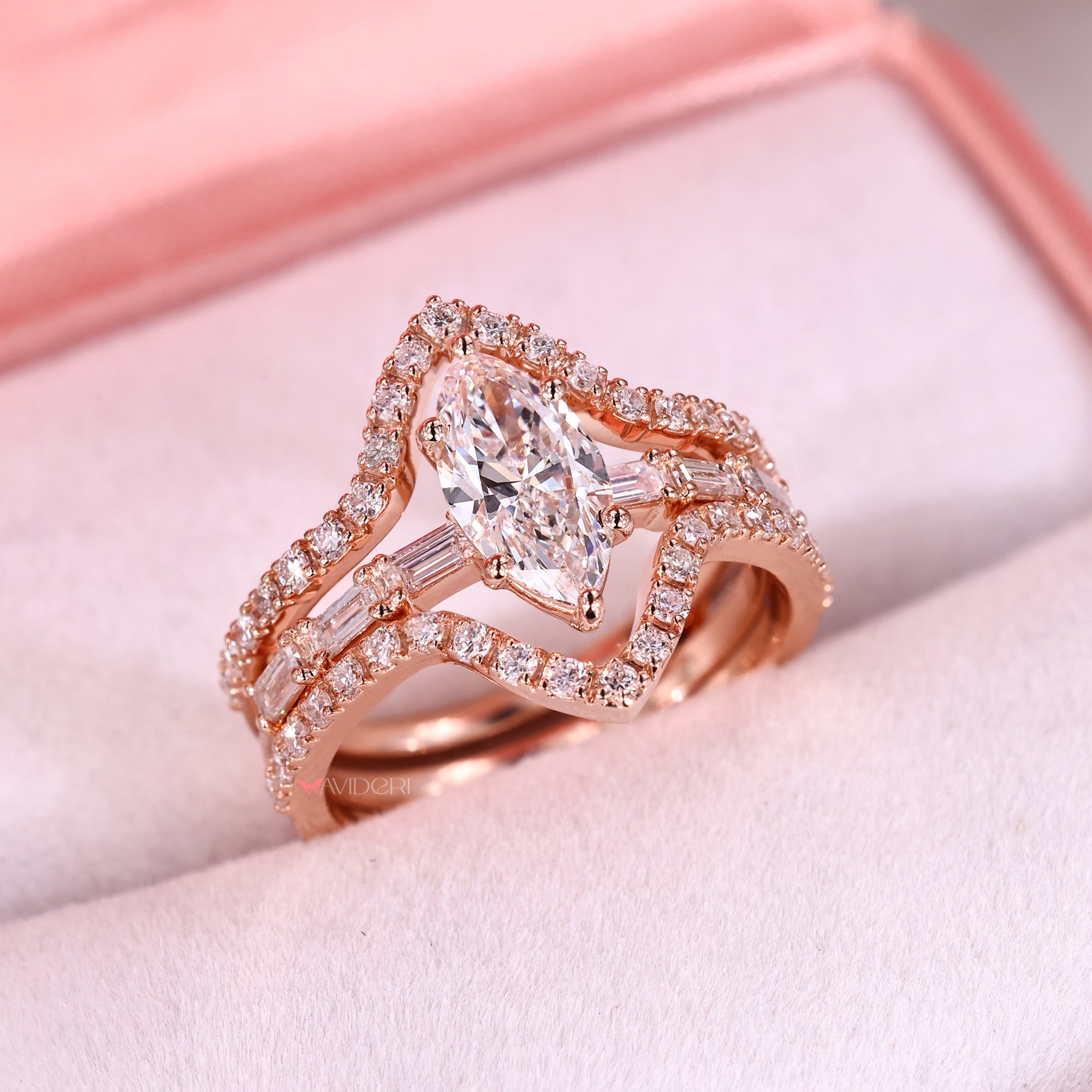 6 prong setting ring on marquise ring with wedding band.