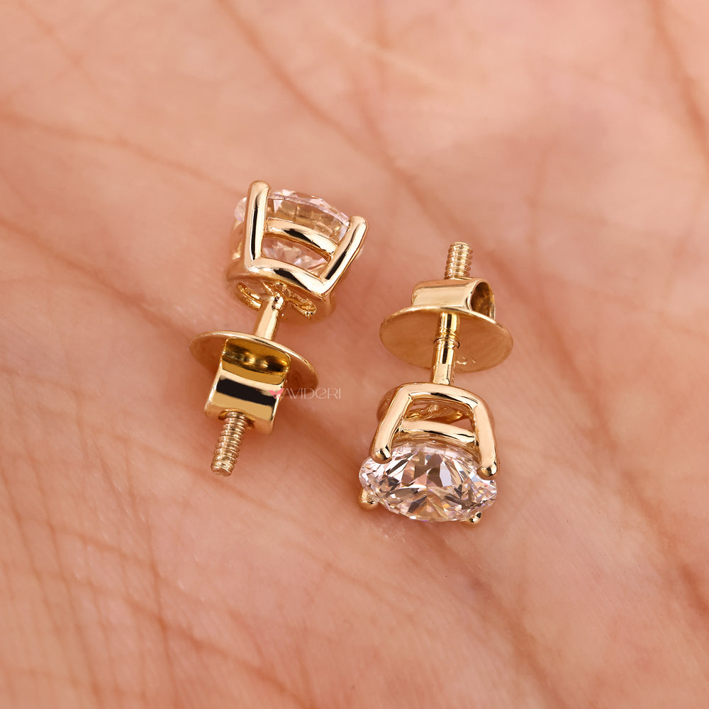 Yellow gold diamond stud earrings in 6mm size.
