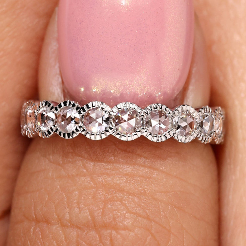Milgrain wedding band featuring a stunning round diamond wedding band design.
