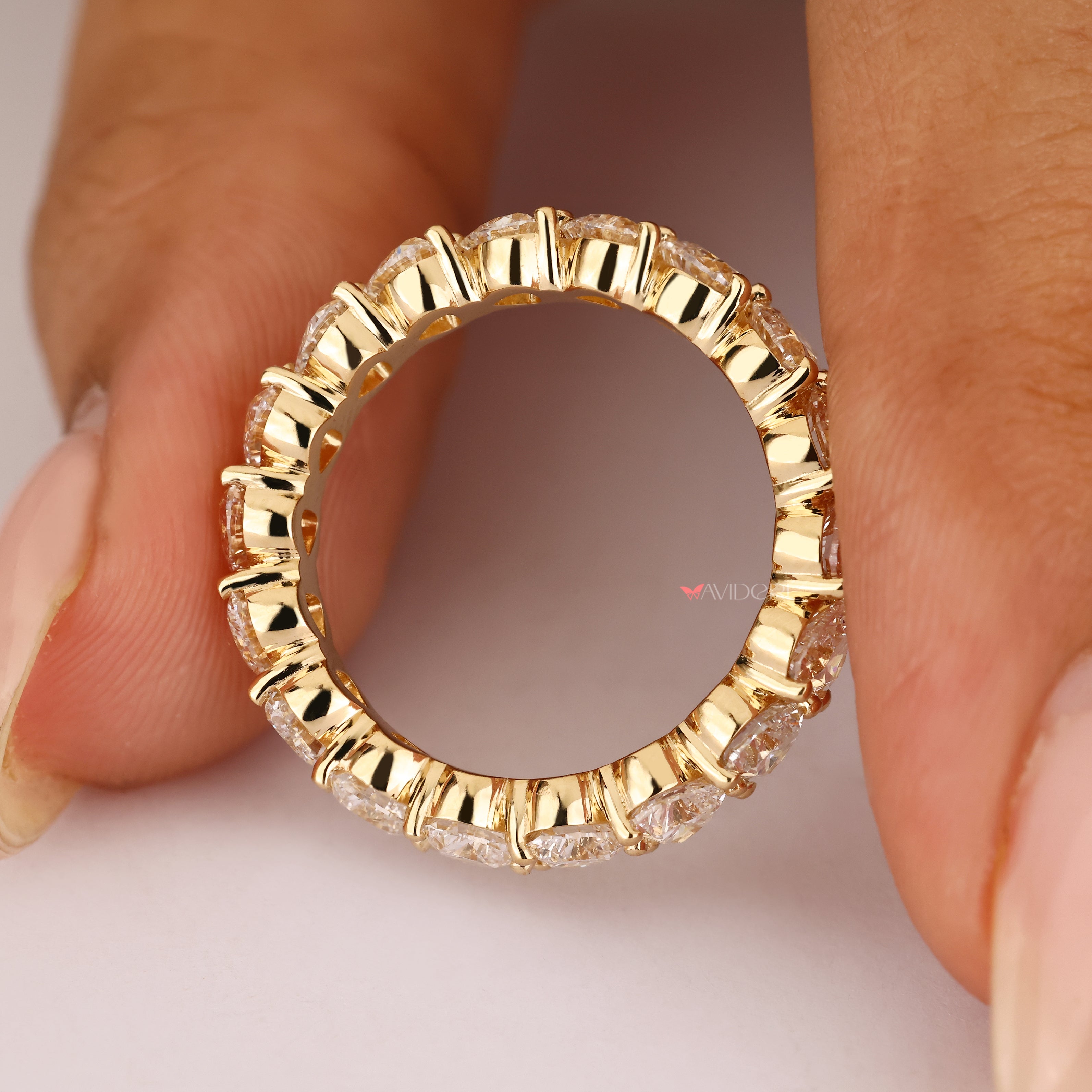 Handmade heart cut diamond wedding band.
