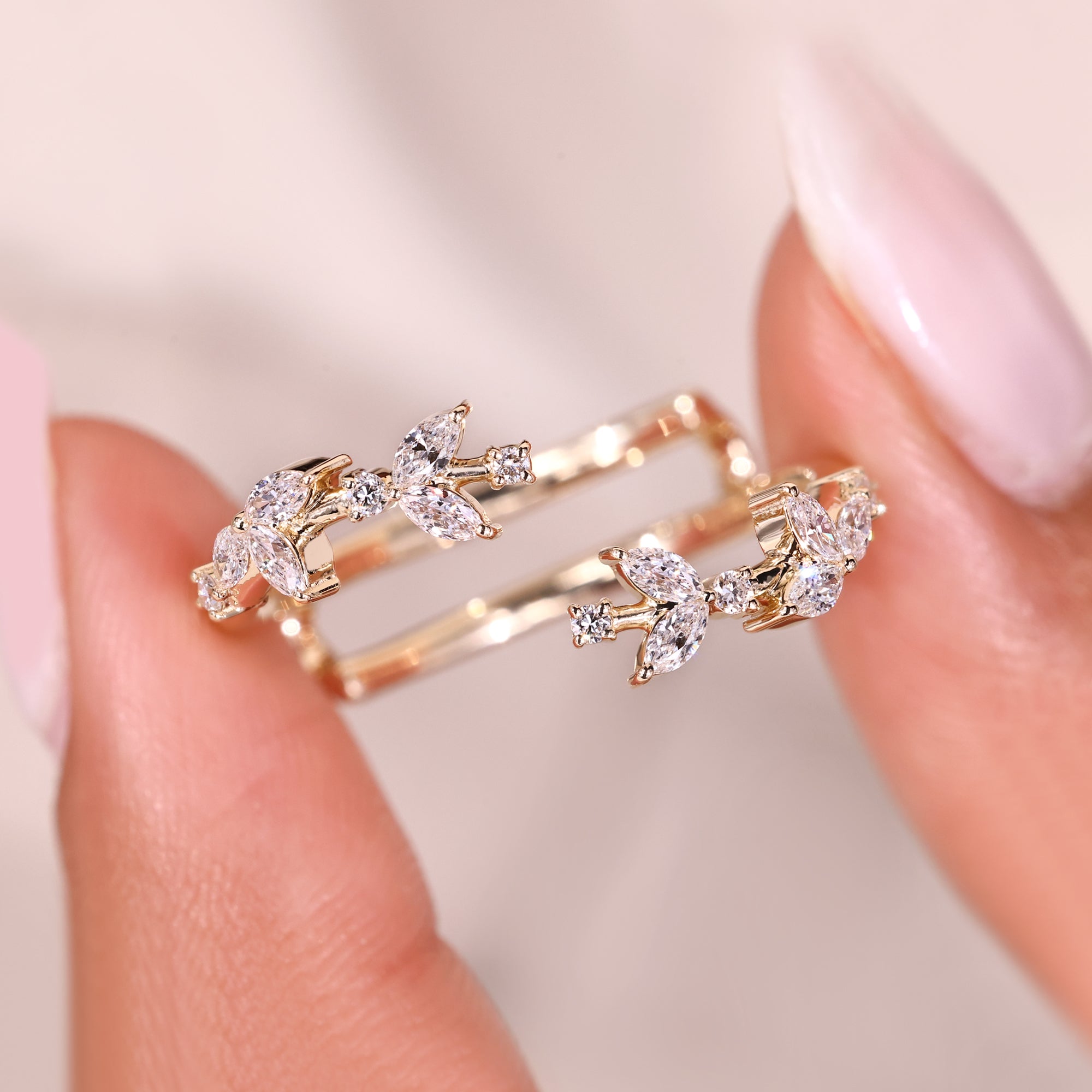 Marquise and round diamond floral enhancer.
