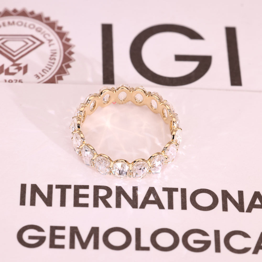 Oval rose cut diamond band in full eternity style.
