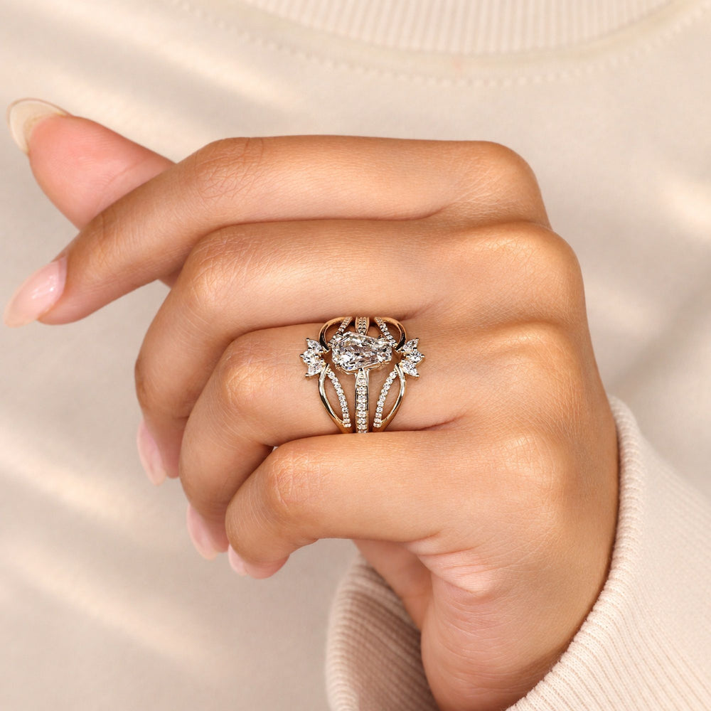 Coffin cut diamond ring with four heart shaped prongs.
