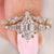 Hexagon diamond engagement ring with marquise and round wedding band
