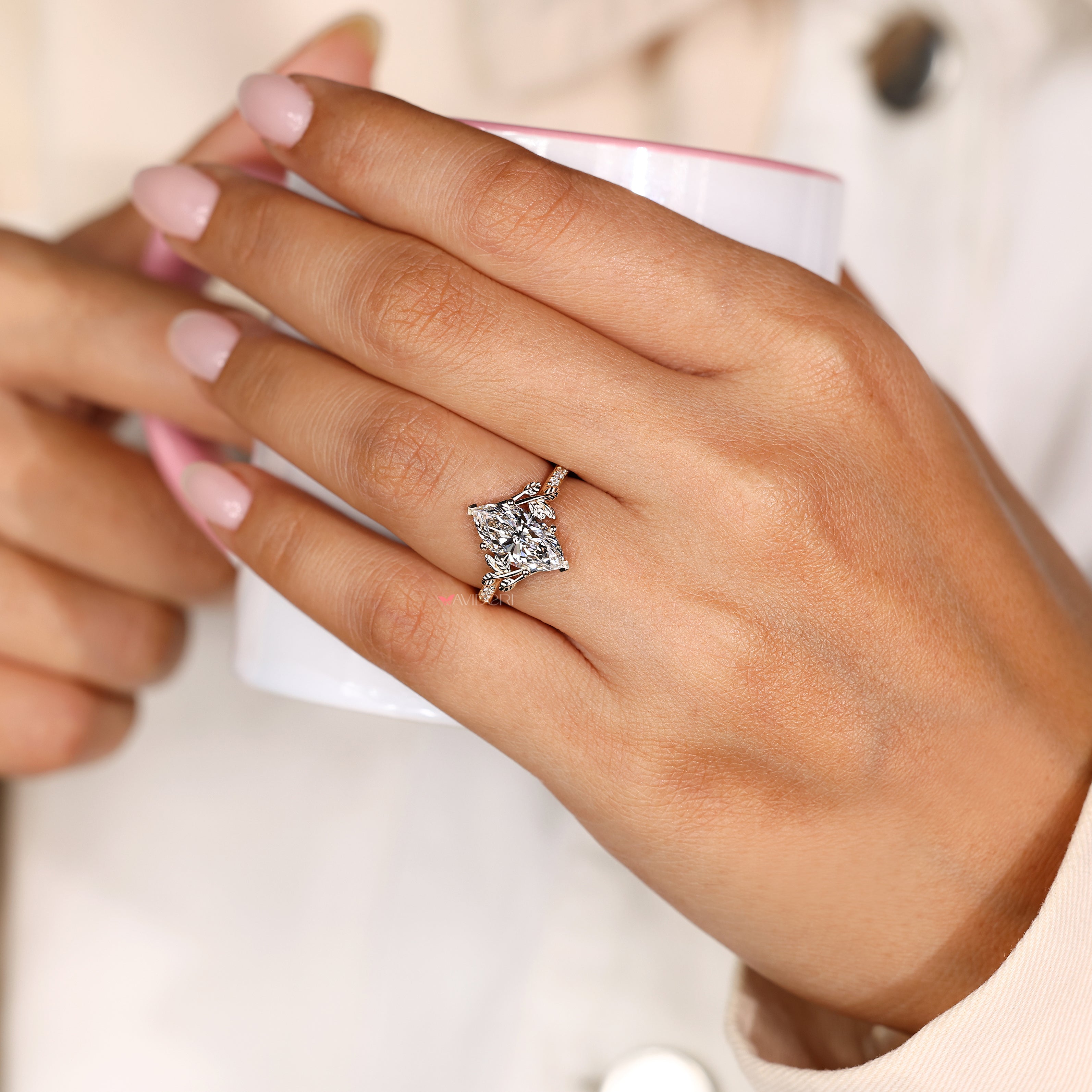 Lab grown marquise diamond ring with Art Deco leaf design
