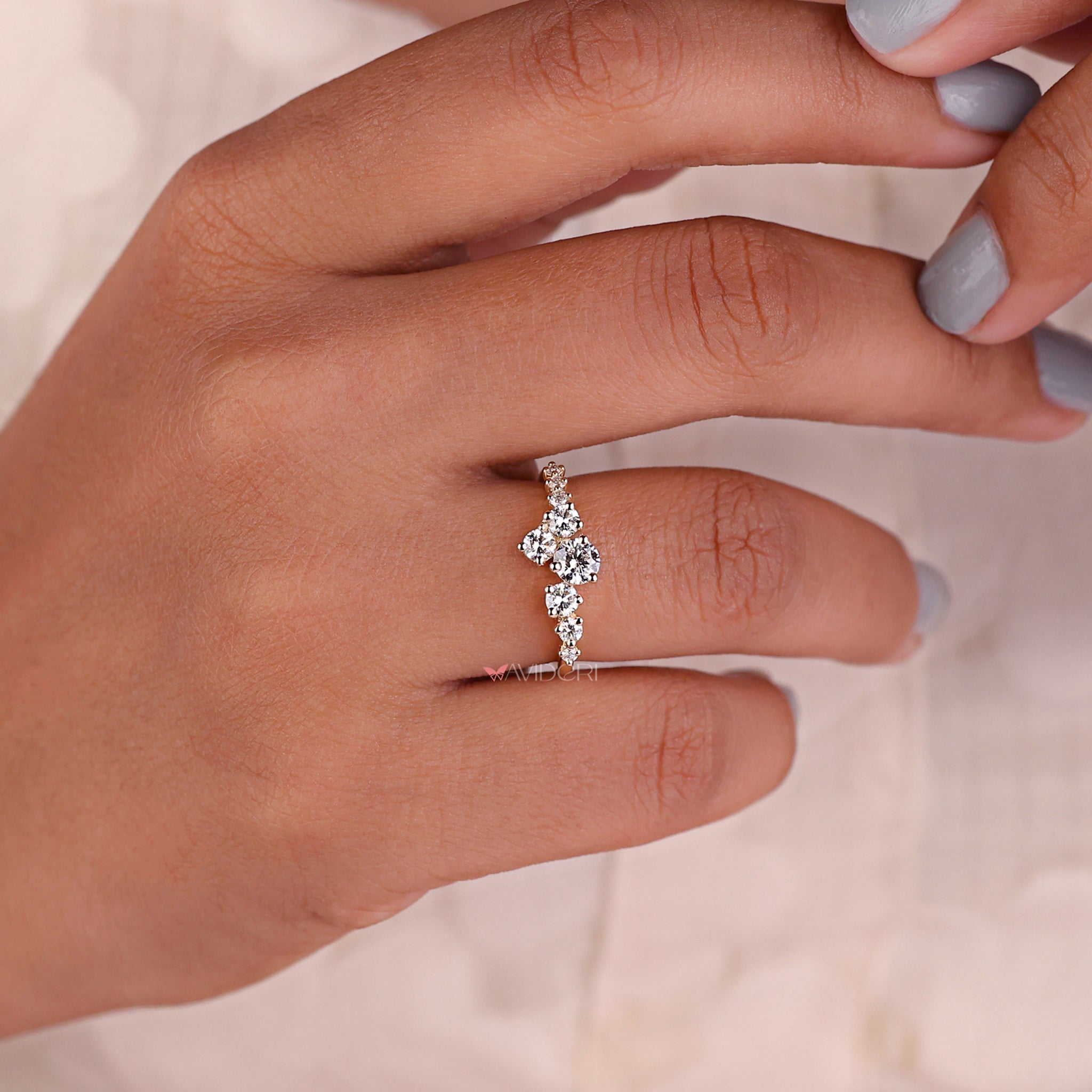 round diamond ring crafted with precision for a dazzling center stone that catches the light beautifully.
