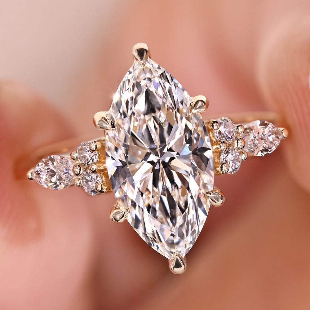 Marquise engagement ring shows brilliant shape and modern beauty.