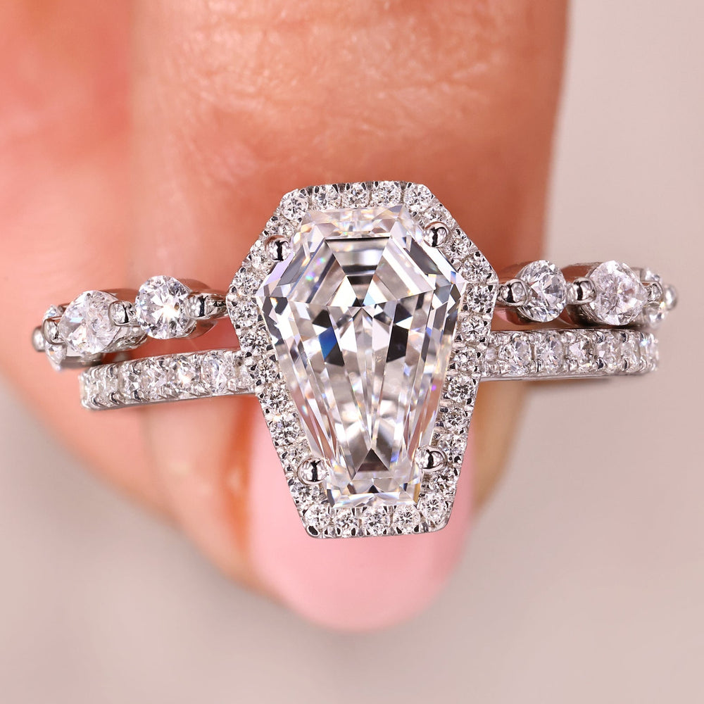 Diamond engagement ring with wedding band in white gold bridal set.