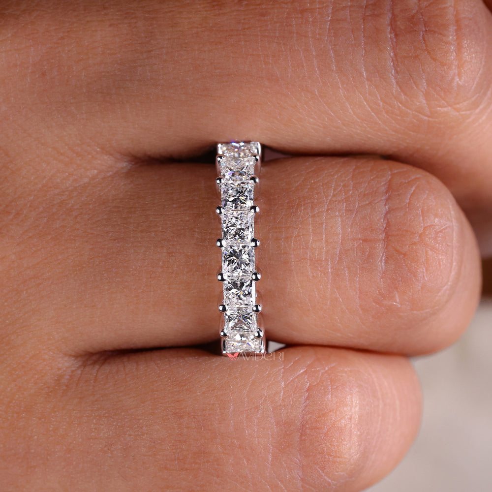 Prong setting band with securely held diamonds.

