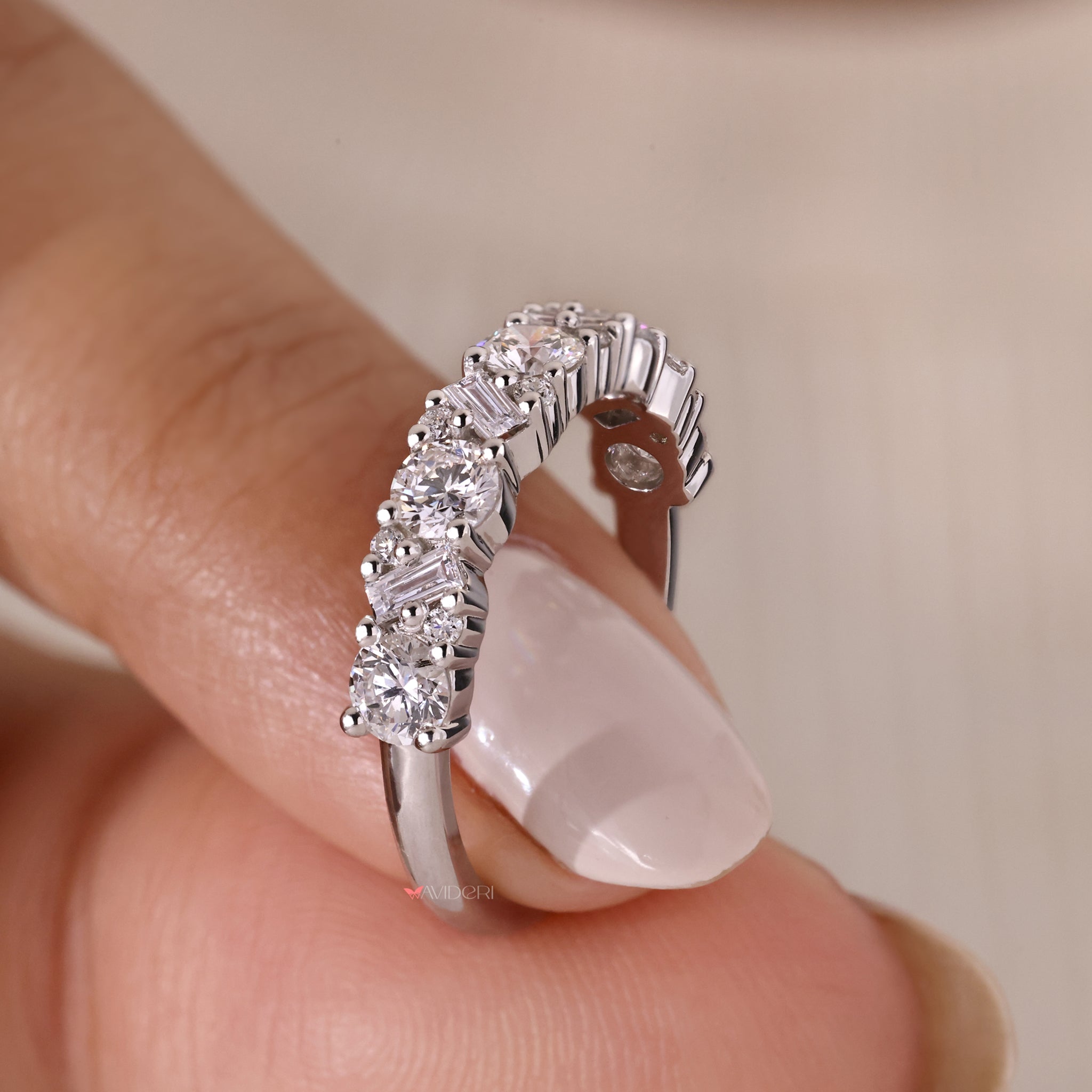 White gold wedding band with timeless diamond accents.
