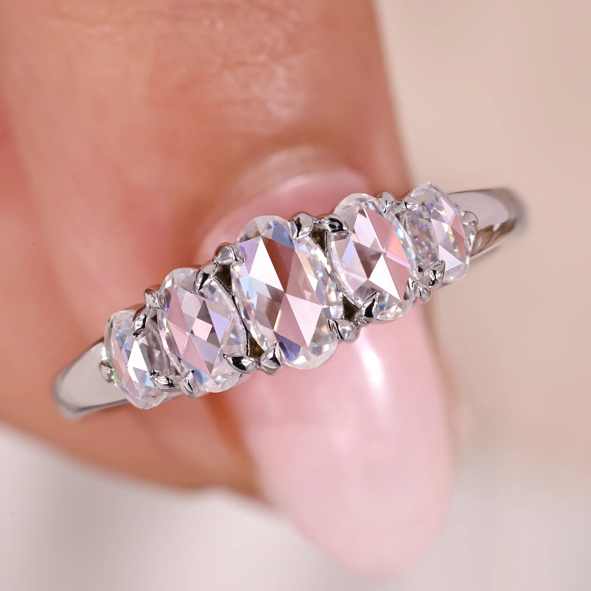 5 stone wedding band with oval rose cut band.