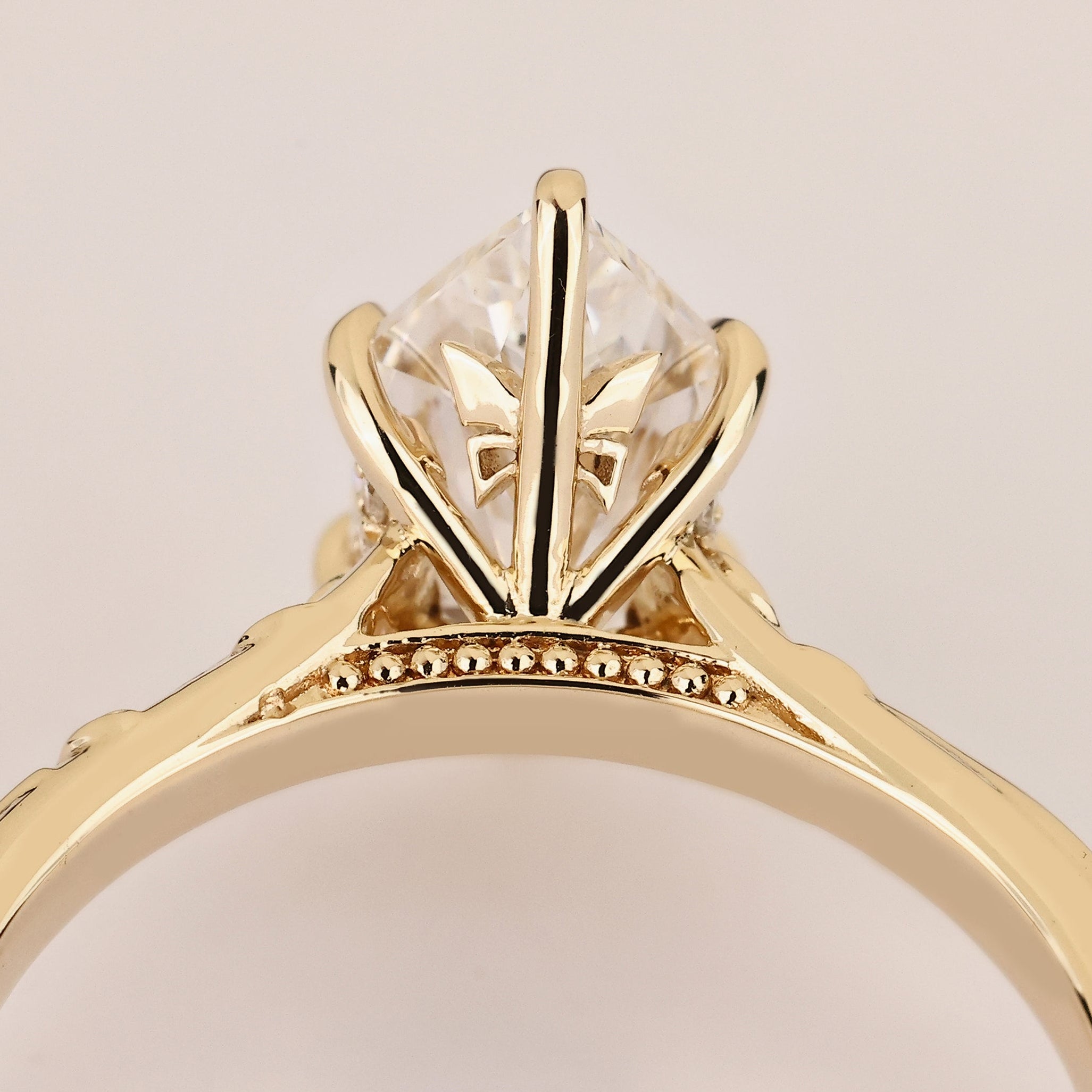Dutch marquise diamond ring with hidden half halo.
