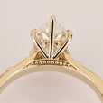 Dutch marquise diamond ring with hidden half halo.
