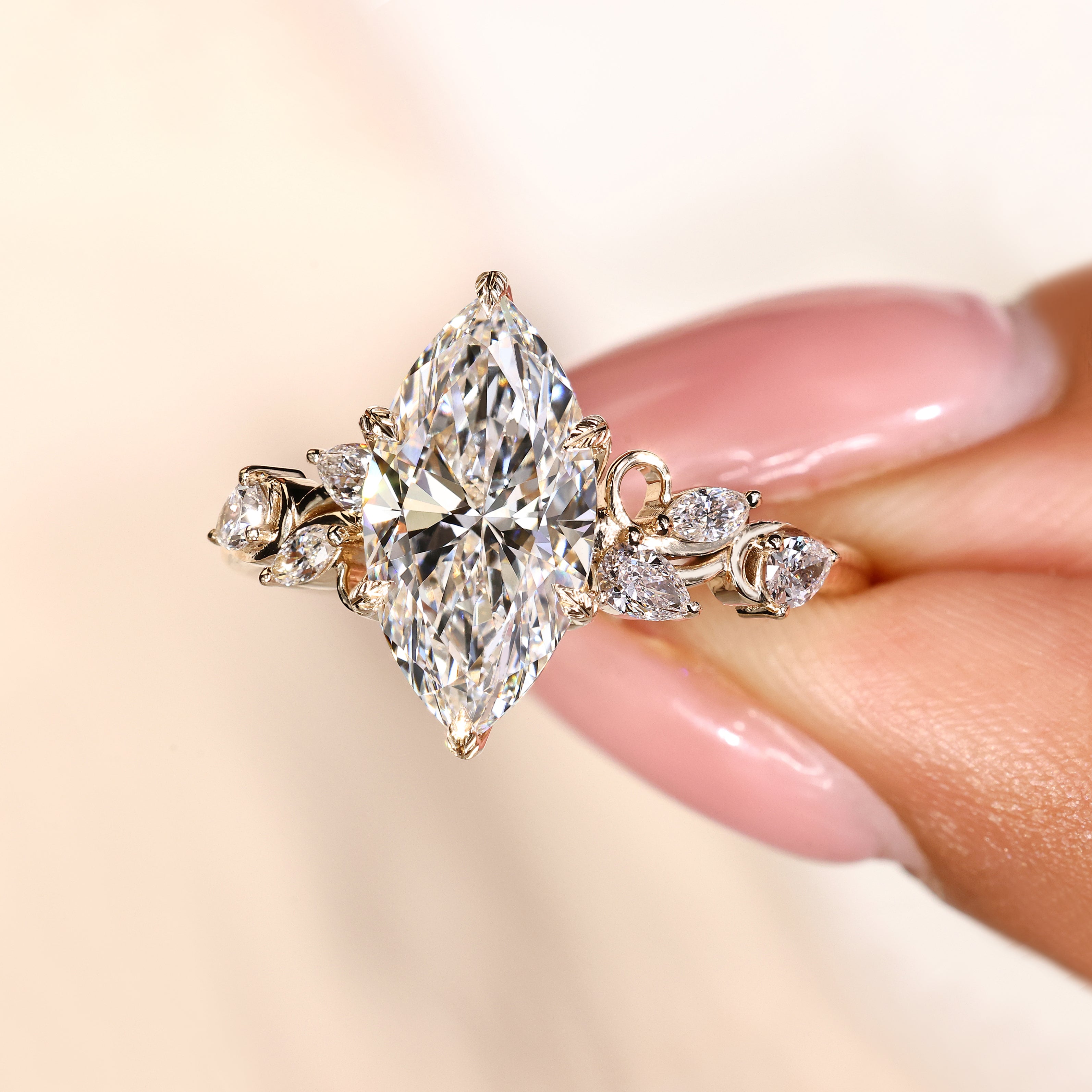 Nature inspired lab diamond ring with marquise and pear stones
