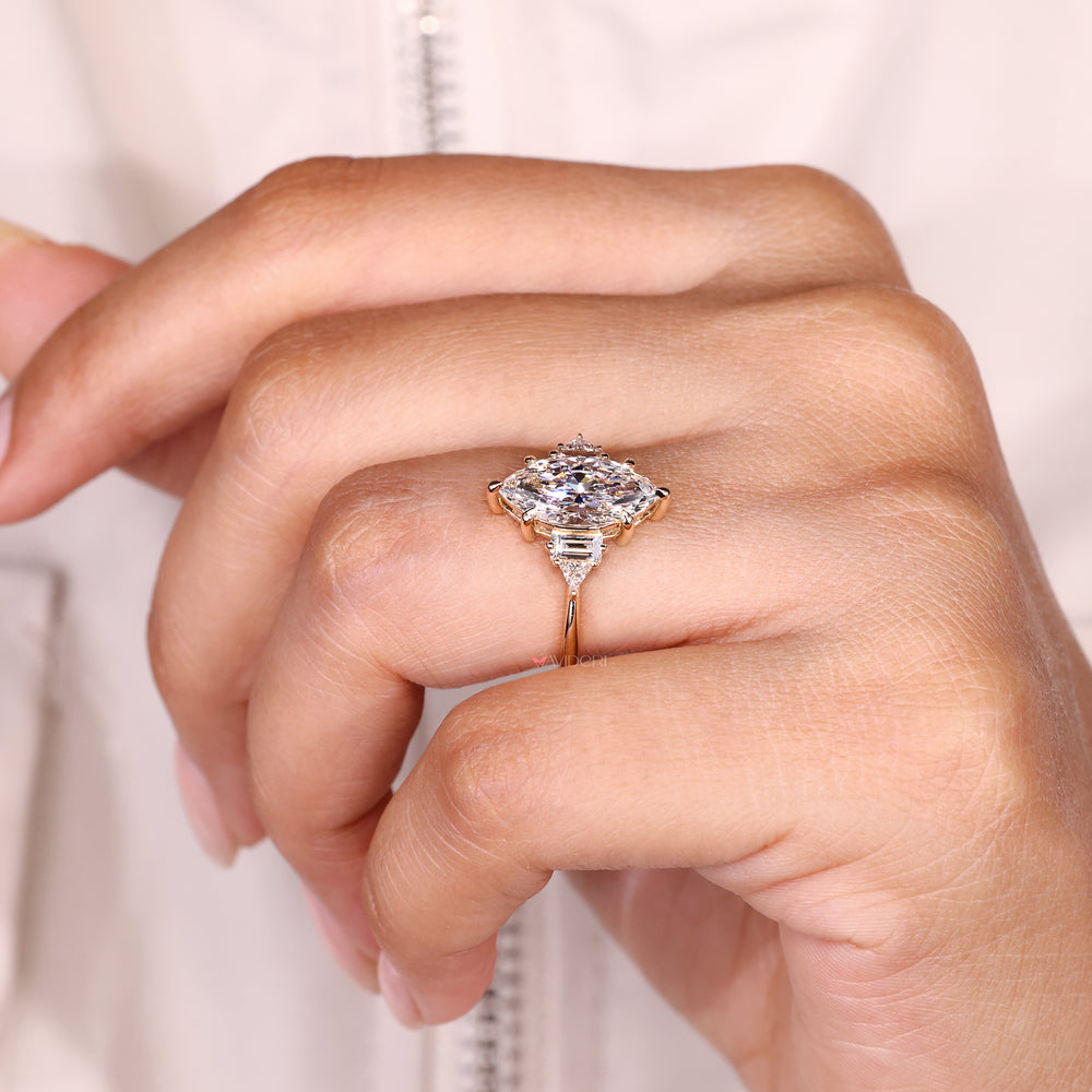 Handmade marquise diamond ring with basket style setting.
