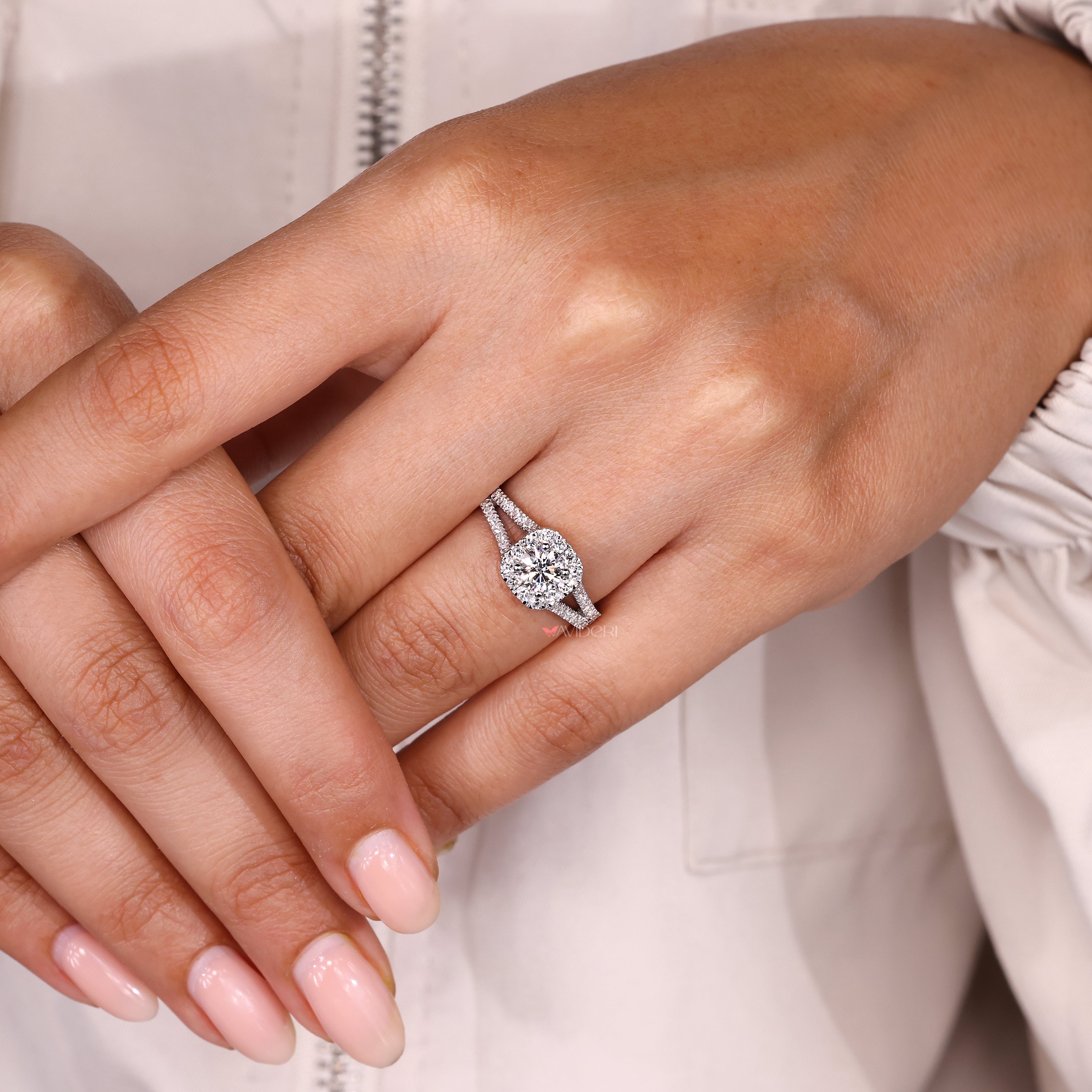Split shank pave round diamond engagement ring.
