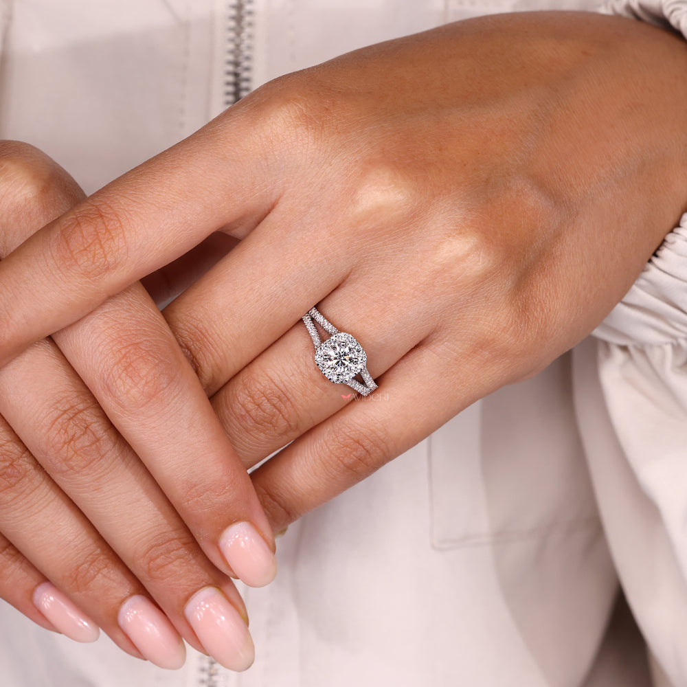 Split shank pave round diamond engagement ring.
