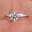 2 ct round diamond engagement ring featuring a stunning hidden halo design in a handcrafted setting.