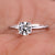 2 ct round diamond engagement ring featuring a stunning hidden halo design in a handcrafted setting.