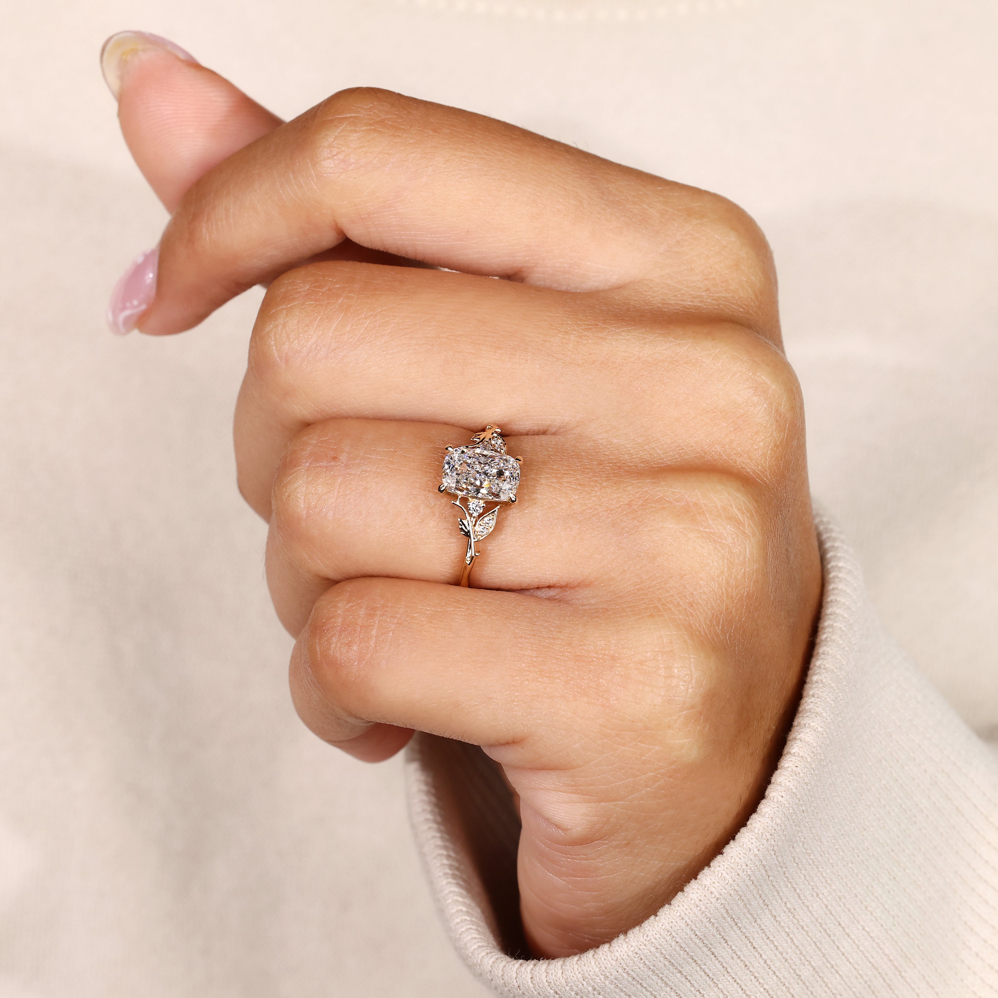 Nature inspired cushion cut diamond engagement ring.
